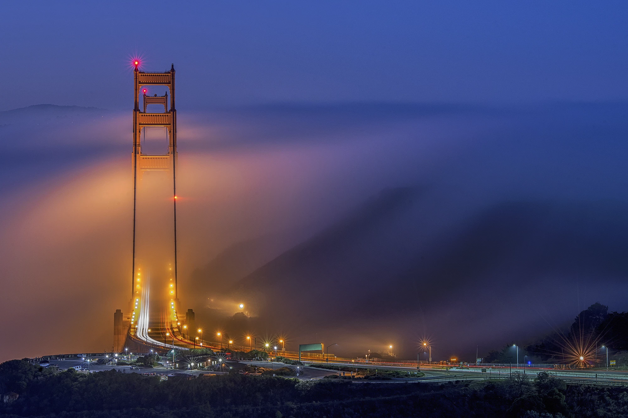 First Place, Cities and Nature. Golden Gate Bridge during a low fog event.