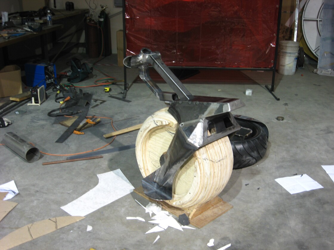 “So to fit all that stuff inside the wheel we needed a big wheel and it’s not so much that we wanted the bike to have a big wheel so it looked bad-ass, it’s just that the wheel IS the body, so we looked around to find the right tire and we came up with an off-the-shelf, 18 x 240 sports motorcycle tire and rim."