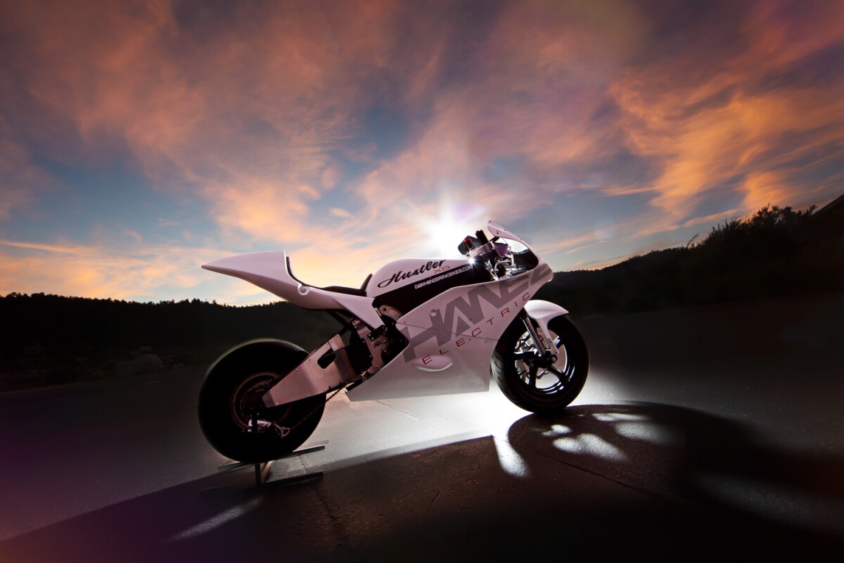 The bike features a Crystalyte 5303 Mid Motor and 14-speed transmission