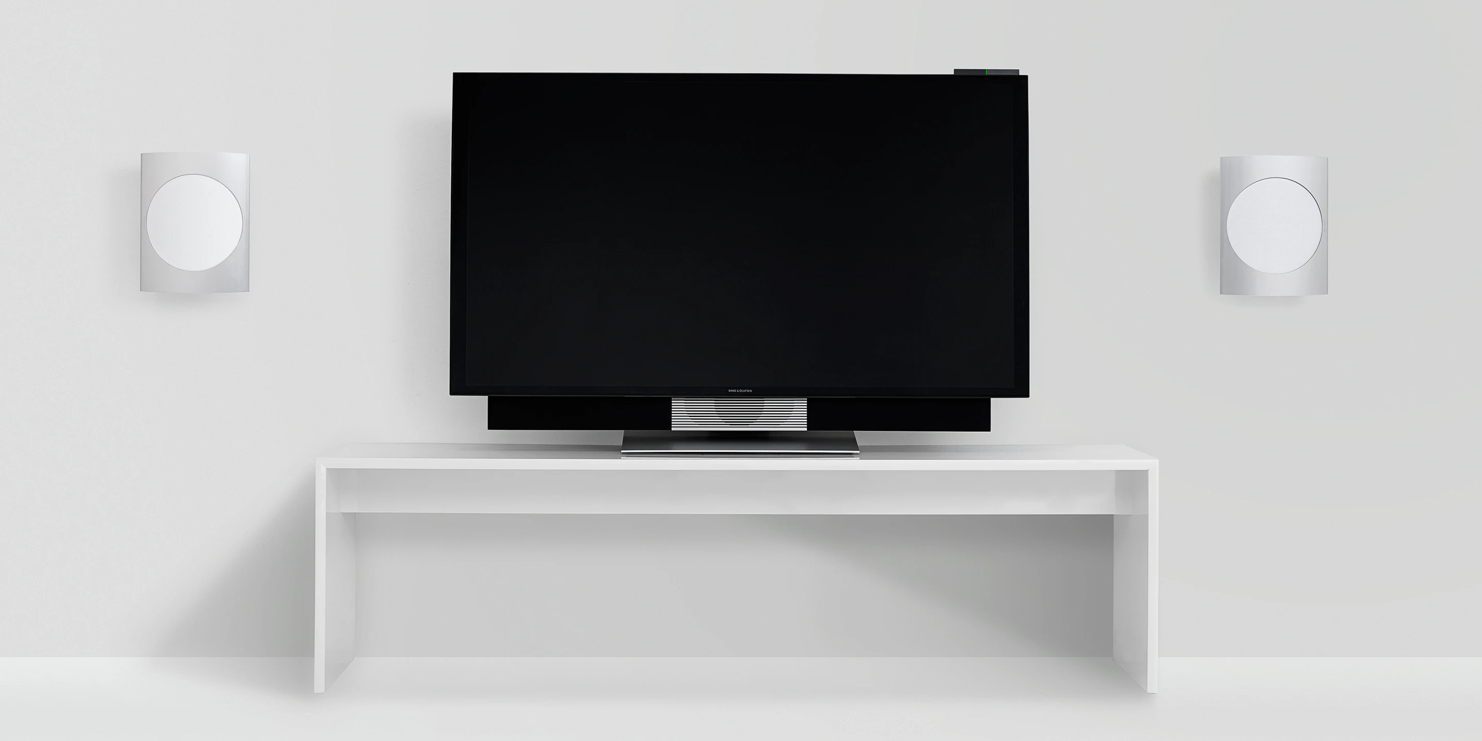 The motorized table stand can raise the TV to attention from its slightly tilted resting position