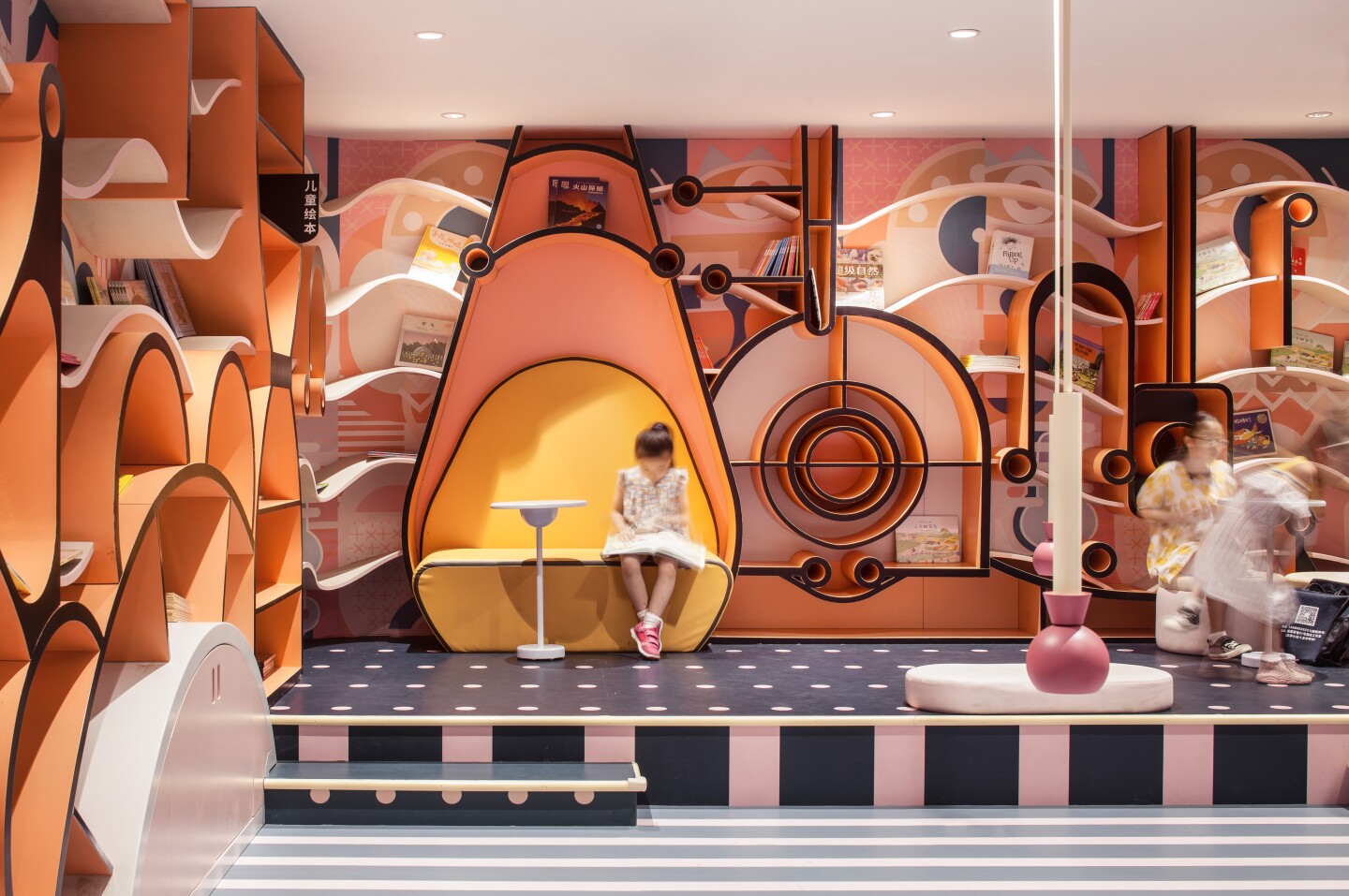Children read inside the Zhongshuge bookstore in Ningbo, China