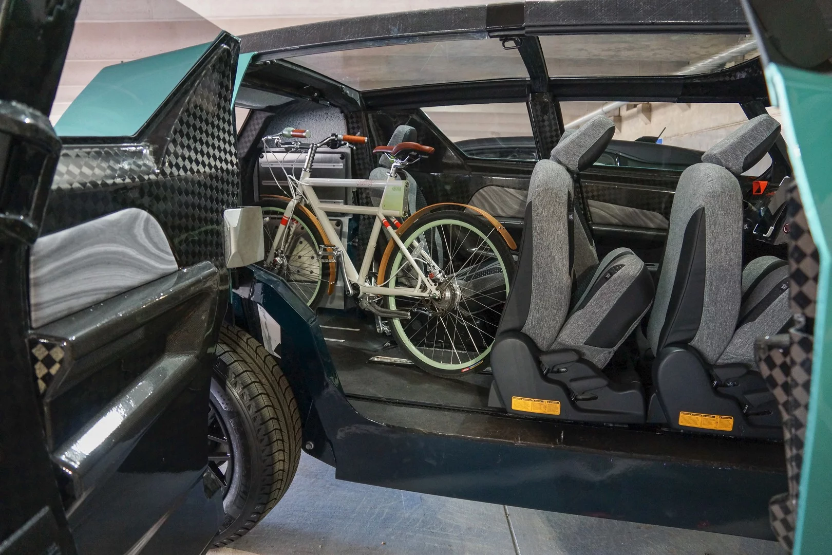 The seats slide and collapse, making room for cargo