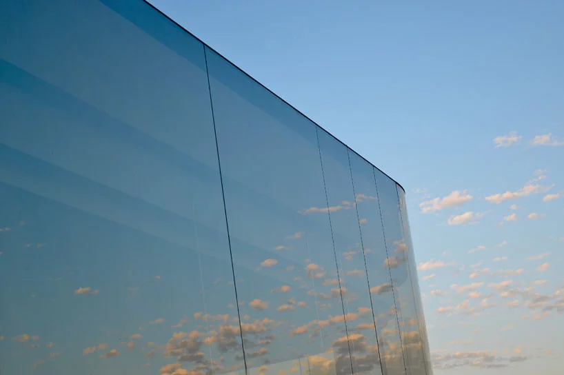 The structure is camouflaged by its neighboring landscape