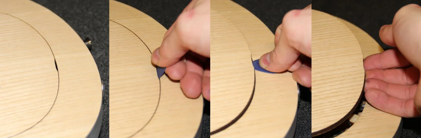 The back plate is held in place by nine magnets and can be removed by slotting a pick into a recess at the back edge and lifting up