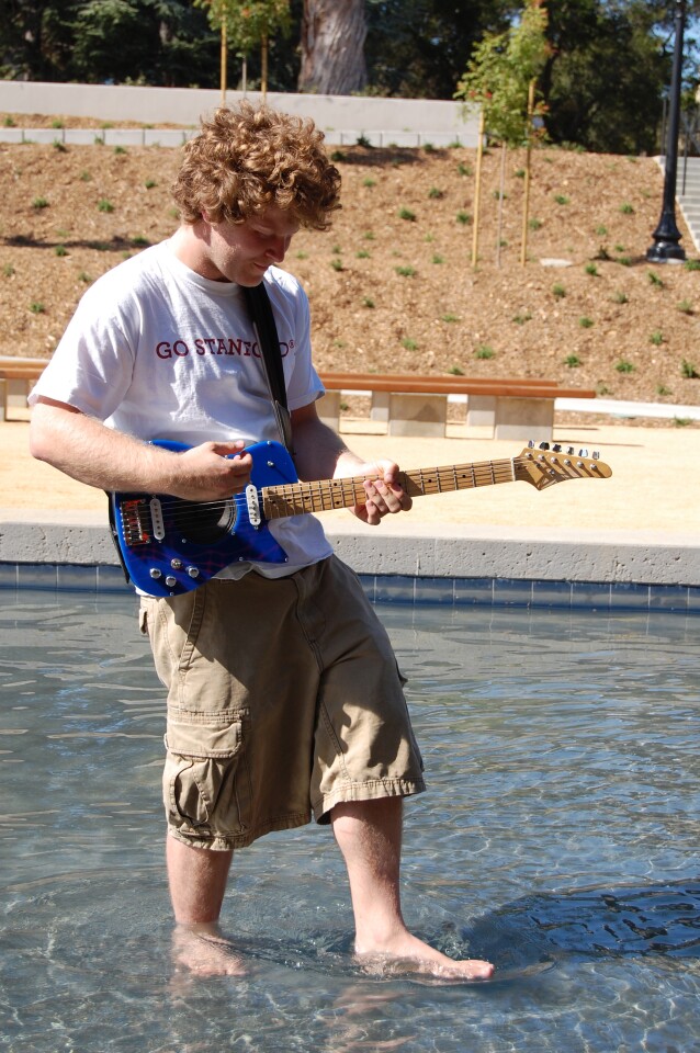 Ari Atkins with the go-anywhere Ultimate electric guitar