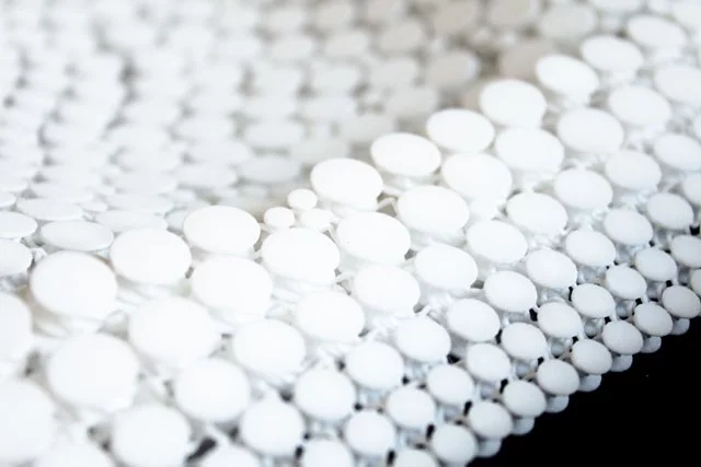 The bikini is made from a material called Nylon 12, which is waterproof and ideal for swimwear