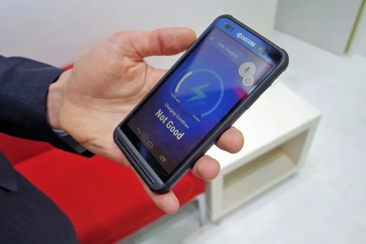 There's a solar-powered charging panel behind this phone's touchscreen, and the technology is almost ready for launch