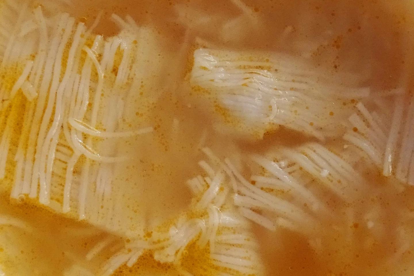 Filindeu, shown here in a bowl of soup, is the thinnest handmade pasta in the world - but it's 1,000 times thicker than nanopasta