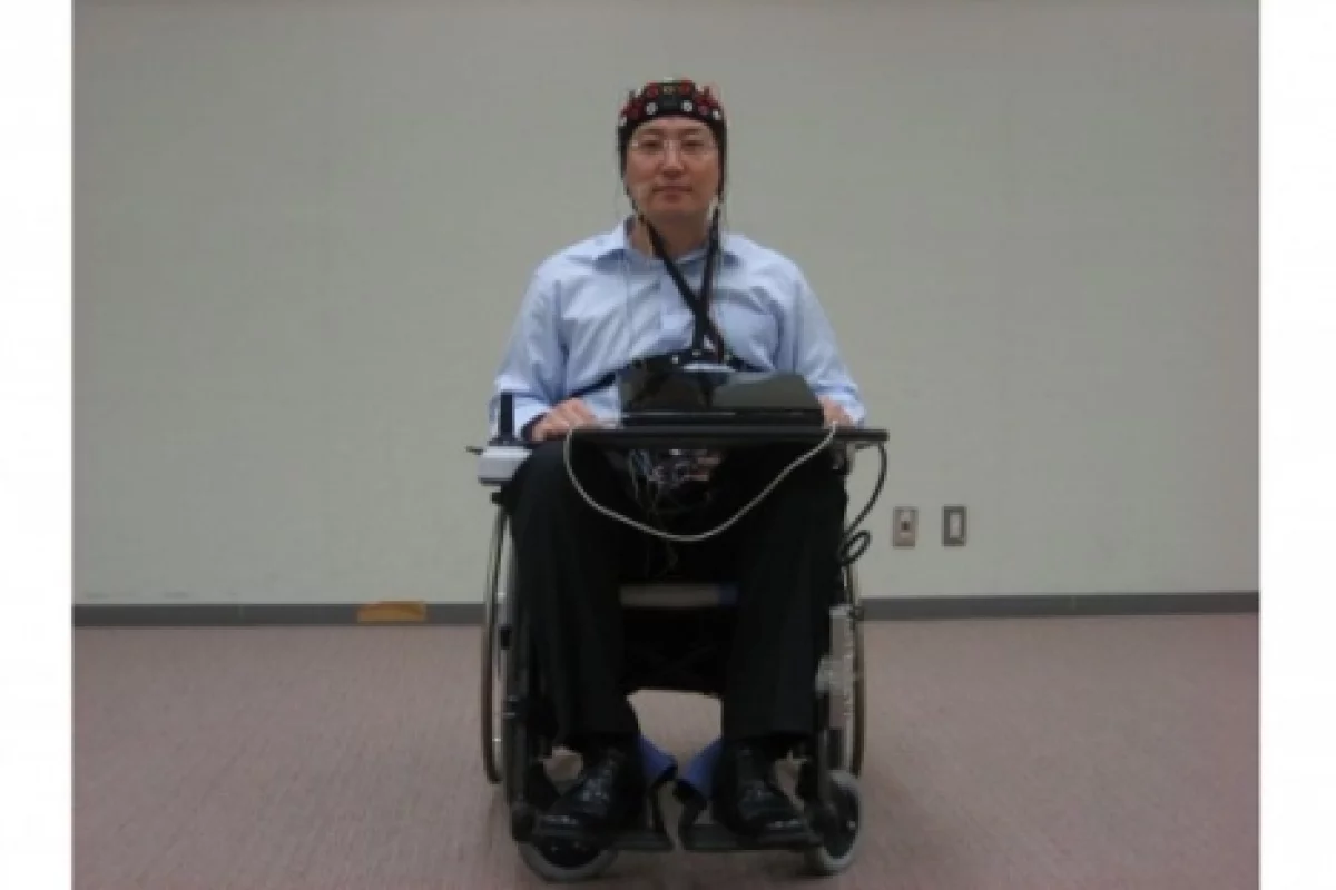 The Toyota/RIKEN wheelchair - this laboratory prototype runs with the EEG detector run by a laptop (Photo: RIKEN)