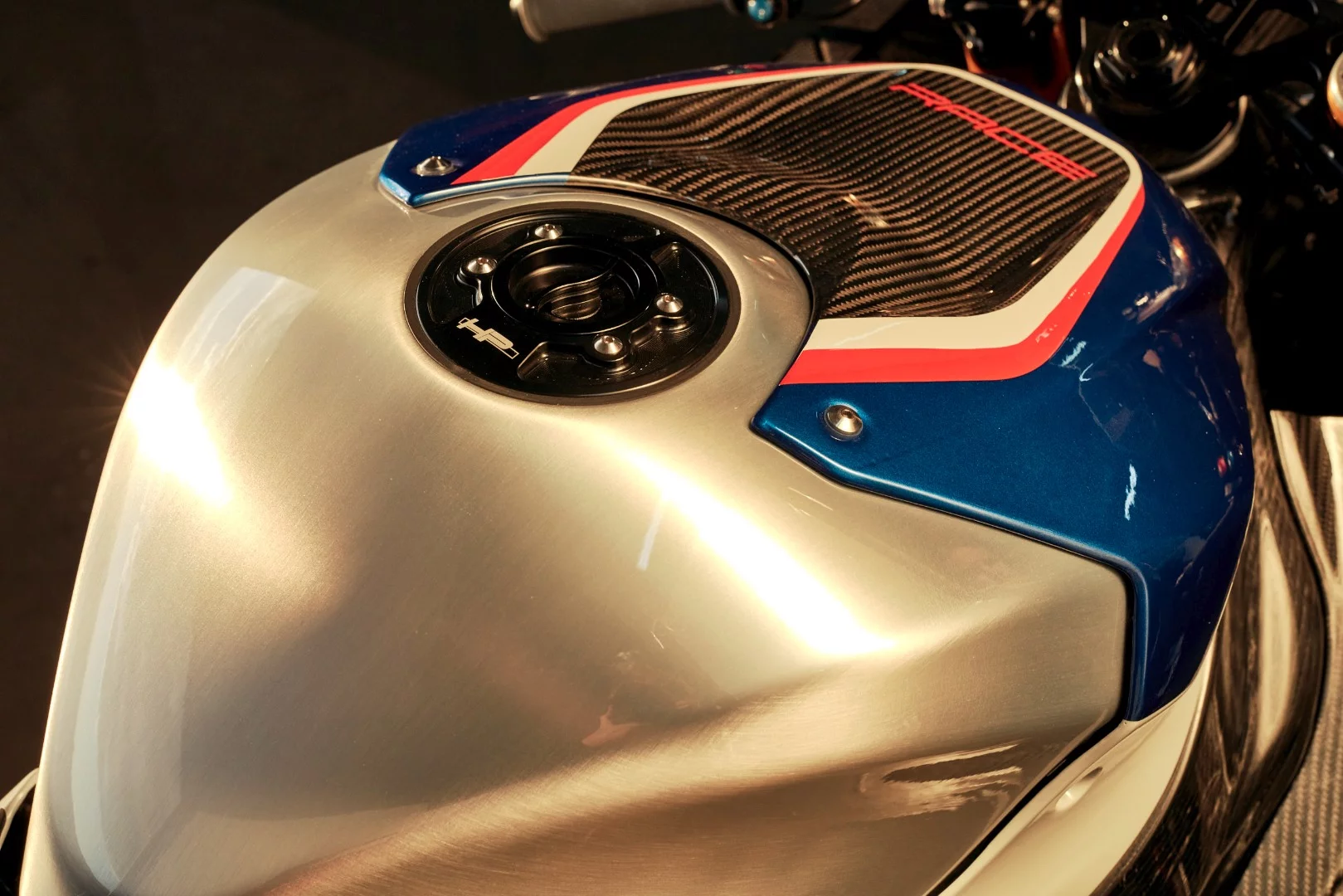 The HP4 Race features a hand-brushed aluminum gas tank