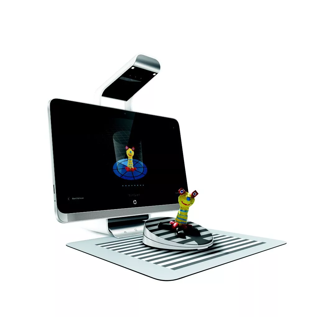 A 3D Capture Stage accessory automatically tilts and rotates objects as the overhead cameras scan them into the computer