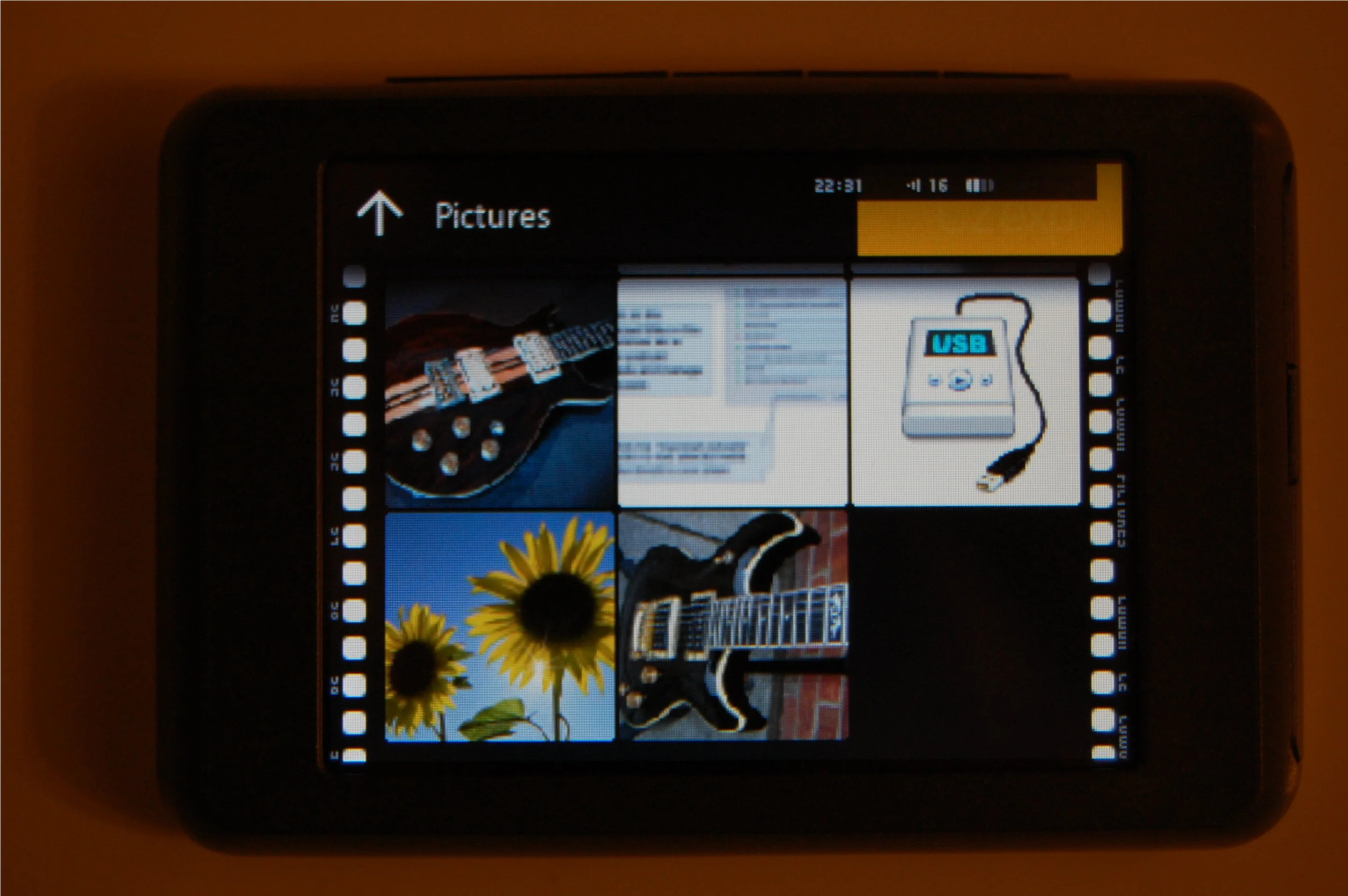 The picture viewer offers six images per screen, each of which can be blown up to fill the screen by touch