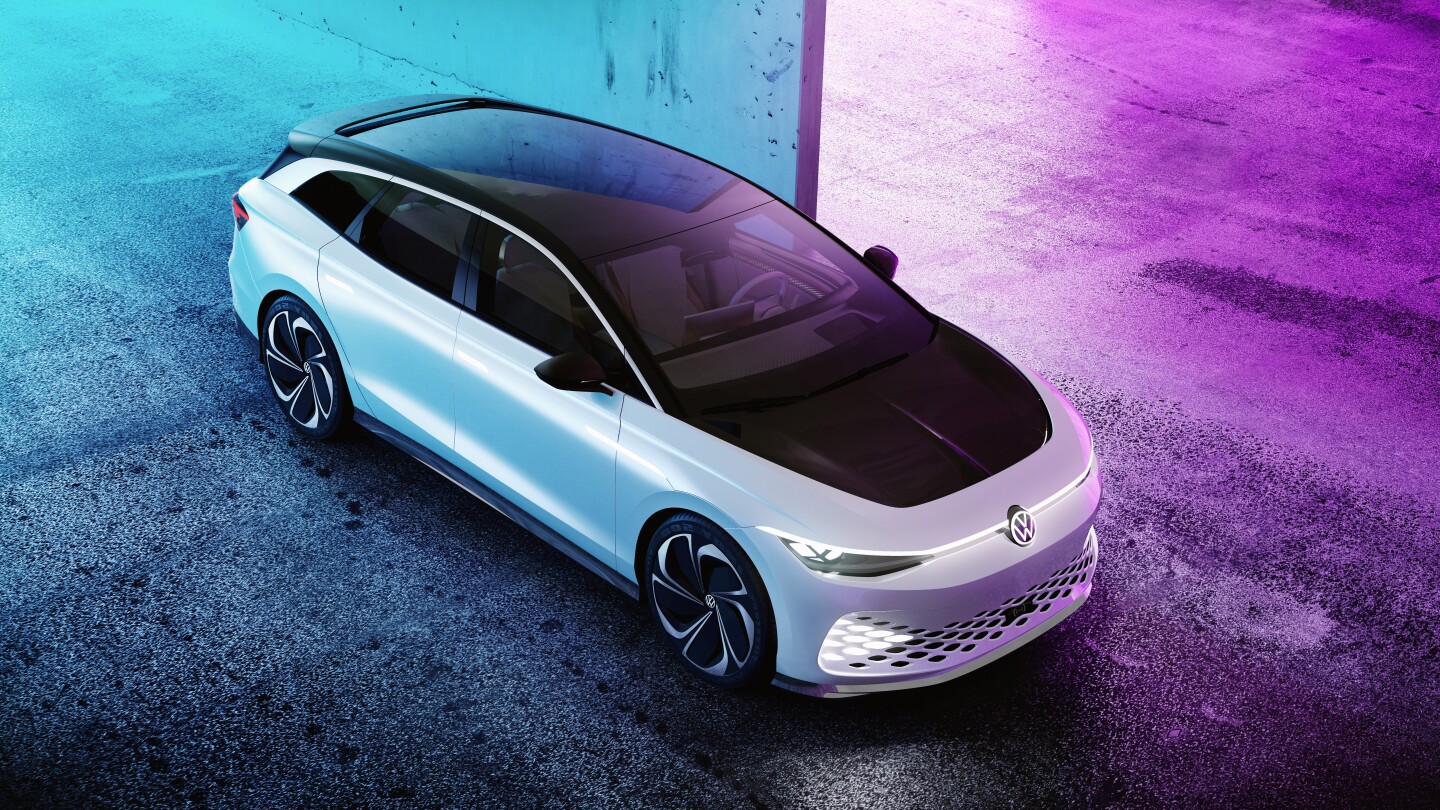 The hood has a high-gloss black paint finish, appearing to blend into the tinted windshield and the black tilt-and-slide panoramic sunroof