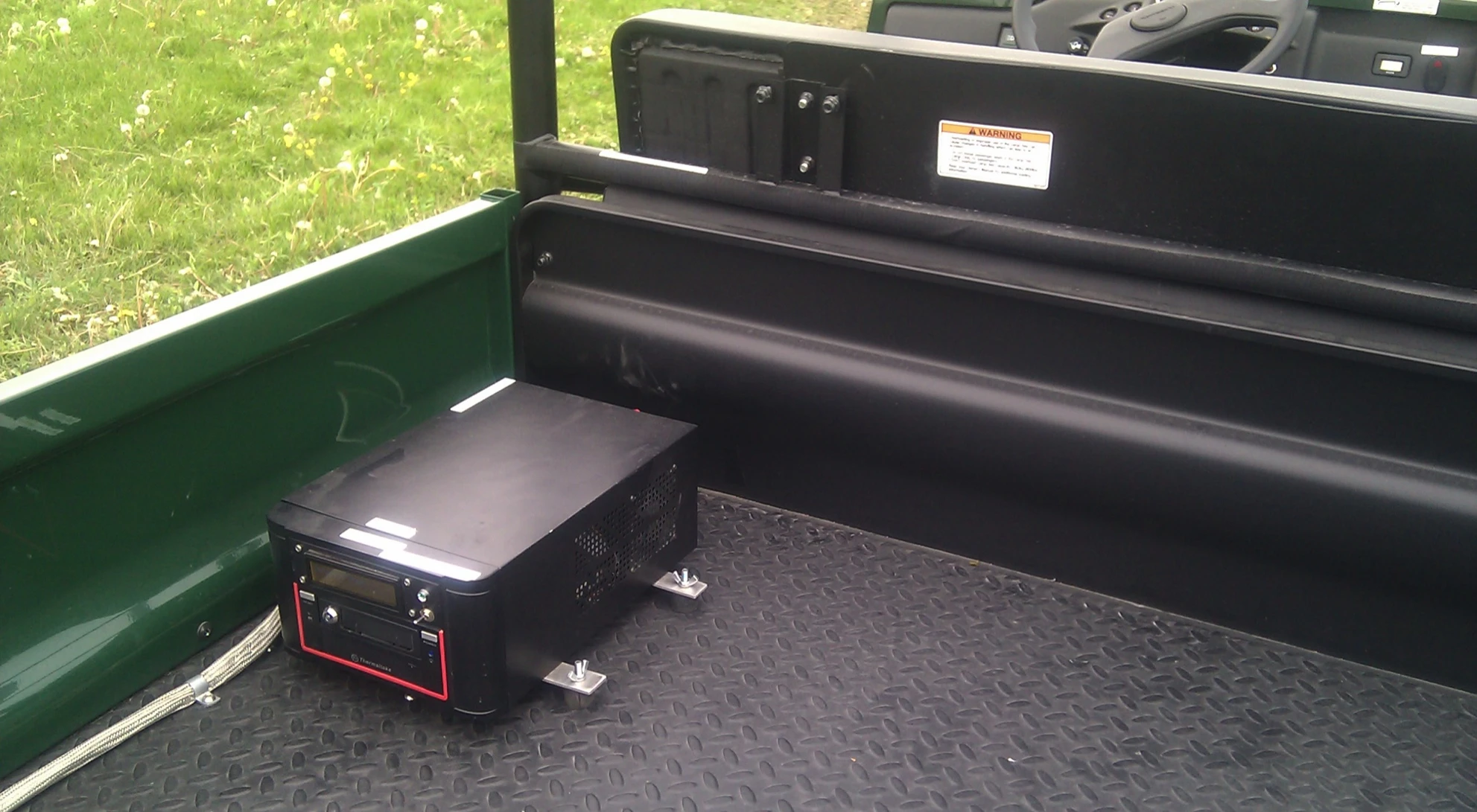 Data gathered by onboard sensors, a front-facing camera and laser rangefinder is analyzed by a custom algorithm, which determines a safe zone where the human driver has full navigational control of the vehicle (Photo courtesy of Sterling Anderson)