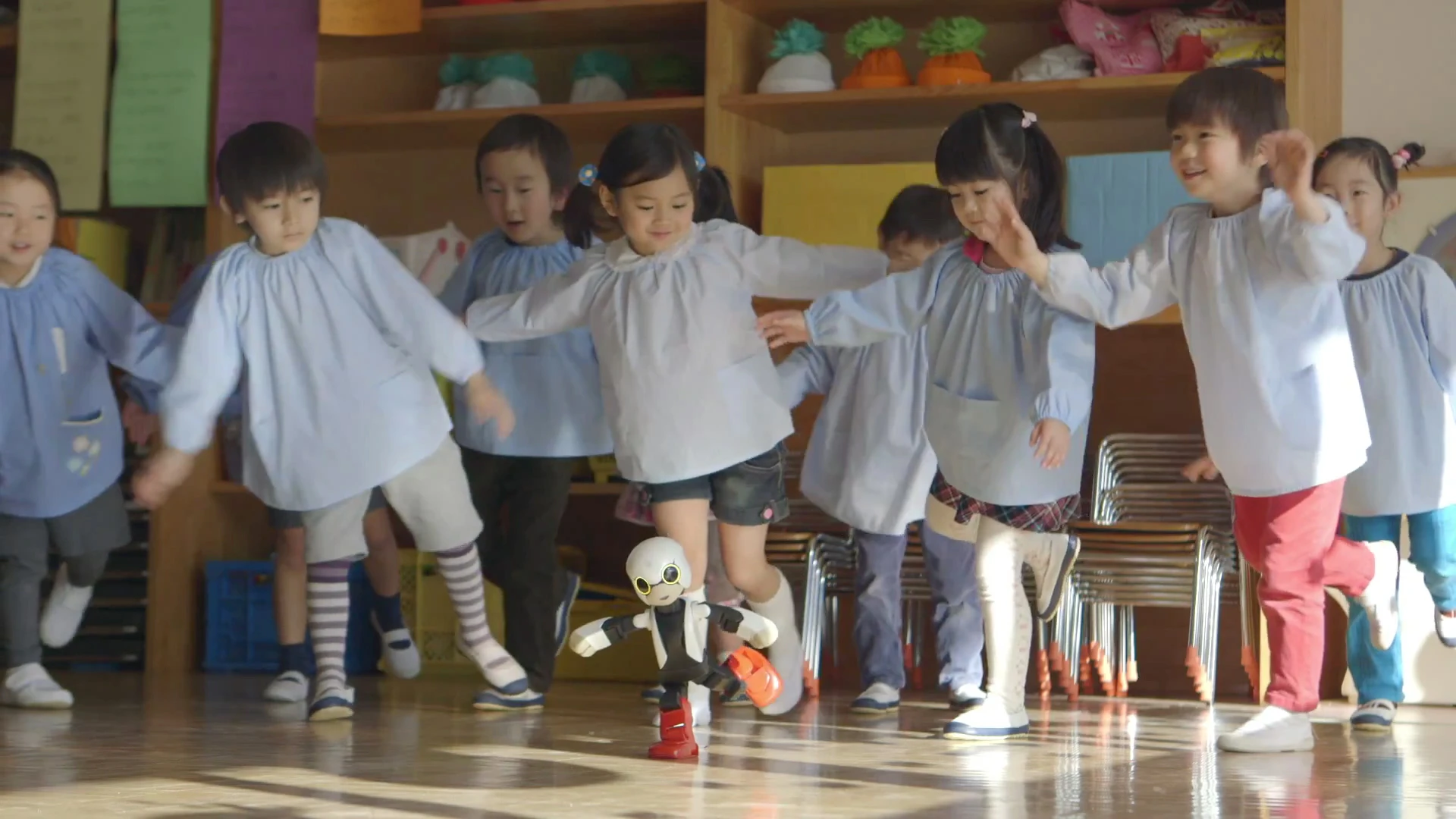 Children mimic the actions of the humanoid robot Kibo