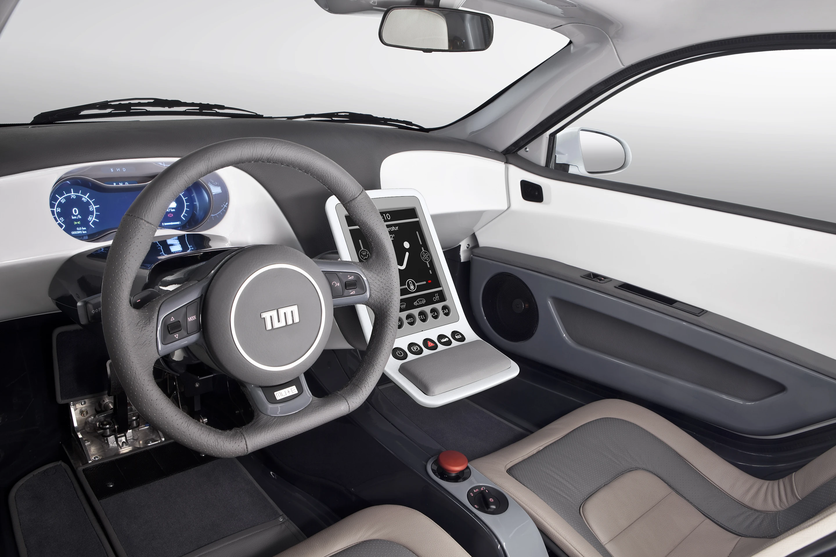 A minimalist internal design features a touchpad user interface in the center