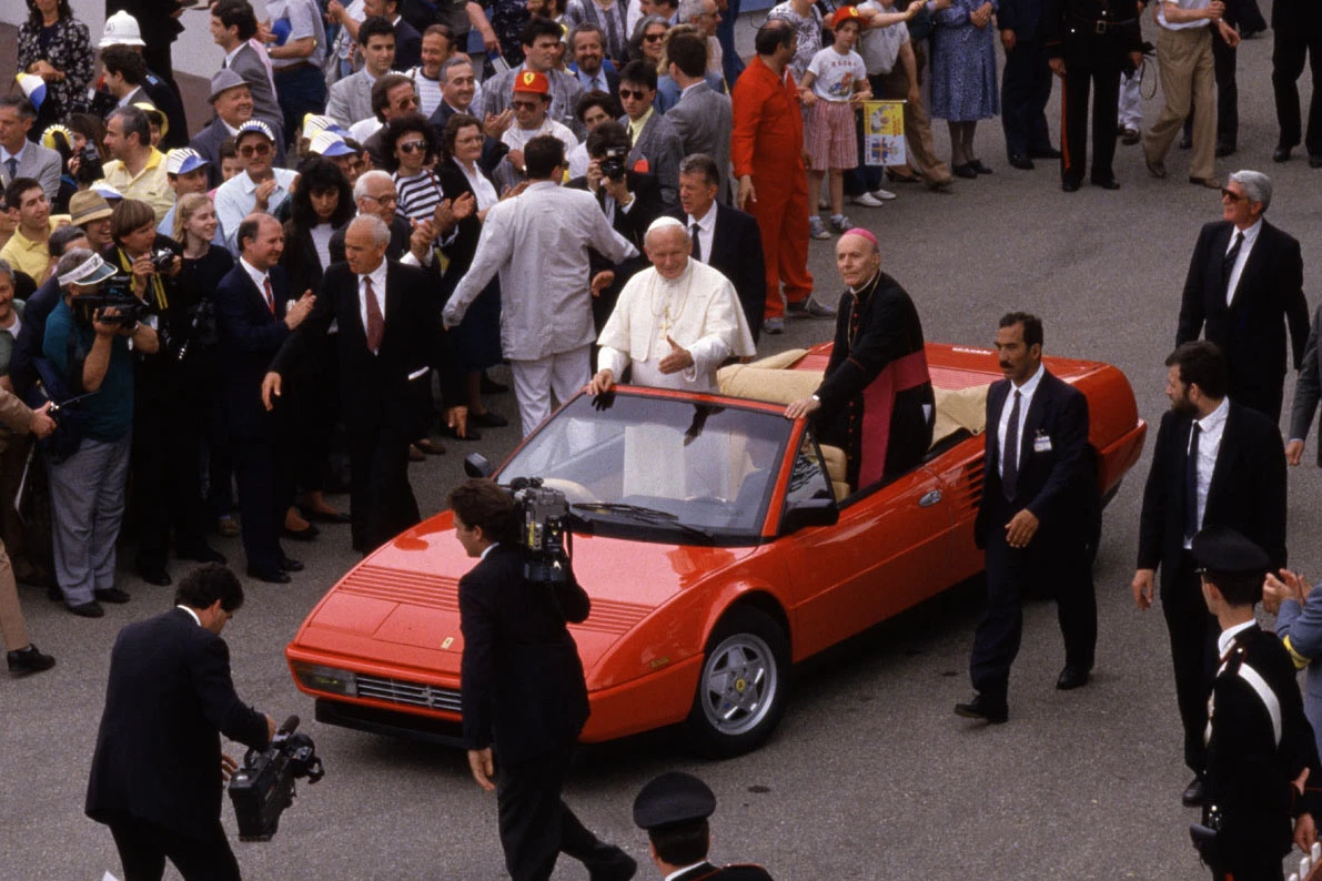 Pope John Paul II had a history with Ferrari, having visited Maranello in June 1988, just prior to the death of Enzo Ferrari. Instead of greeting the Ferrari town in his Popemobile, the Pontiff asked to do it in a Ferrari.