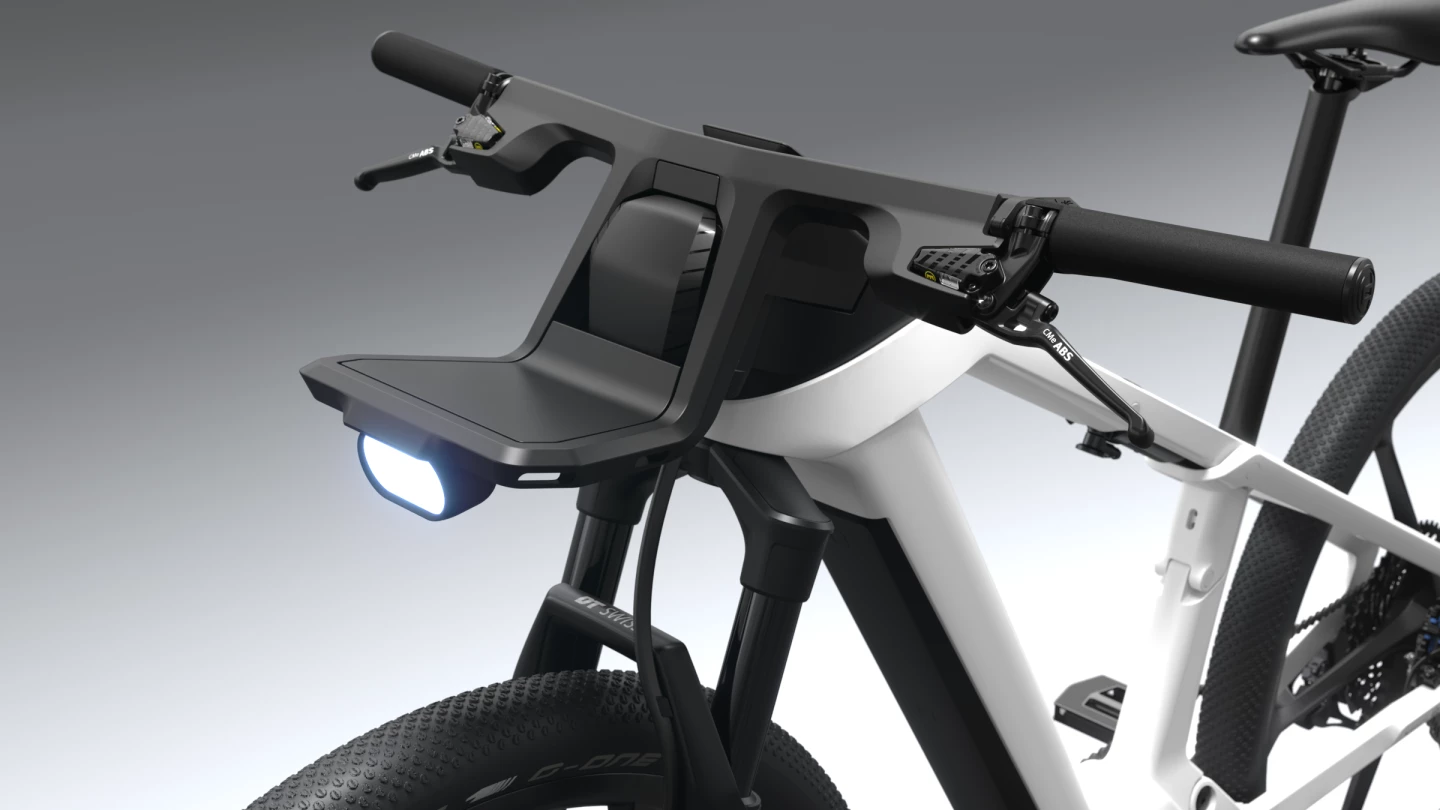 The front cargo rack and headlight sit in front of the eBike ABS module