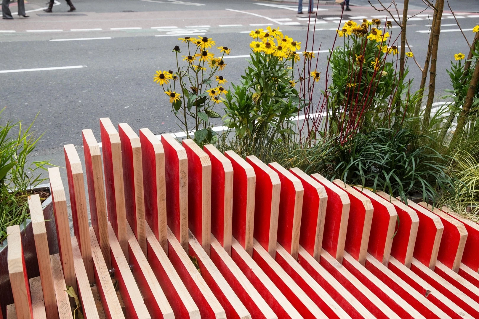 ParkedBench has integrated spaces for planting