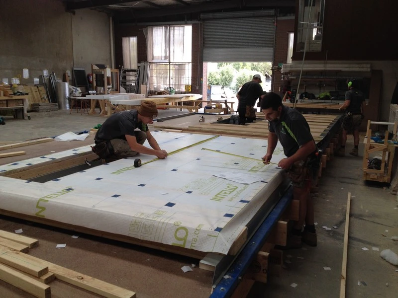Lining the Castlemaine Passivhaus panels with "Intello Membrane"