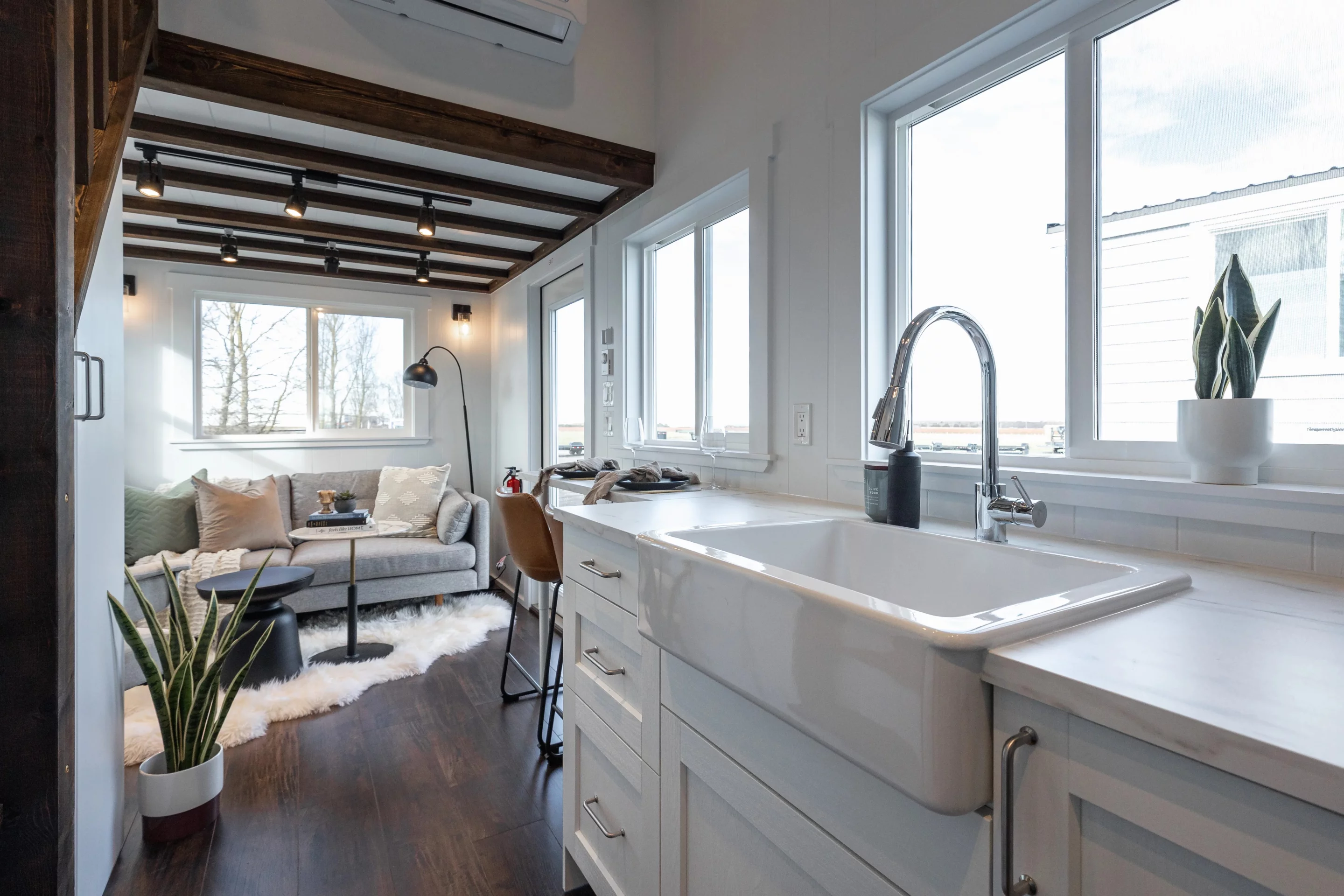 The Violet Edition – Scarlett Loft's kitchen features a barnhouse-style sink and butcher block veneer countertops