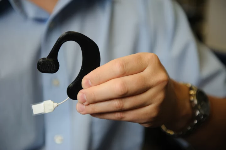 The prototype Automatic Ingestion Monitor with its motion sensor visible at the bottom, in white (Photo: University of Alabama)