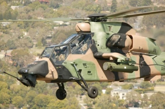 An ARH Tiger over Canberra Photo by Corporal Rob Nyffenegger, Photo courtesy: Australian Department of Defence