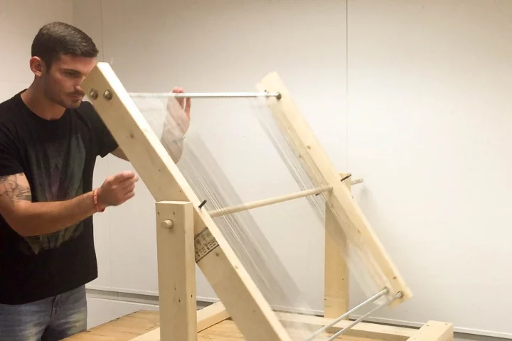 Josh Tulkoff constructs a large prototype of the fog harp