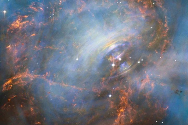View of the Crab Nebula made up of three separate Hubble images