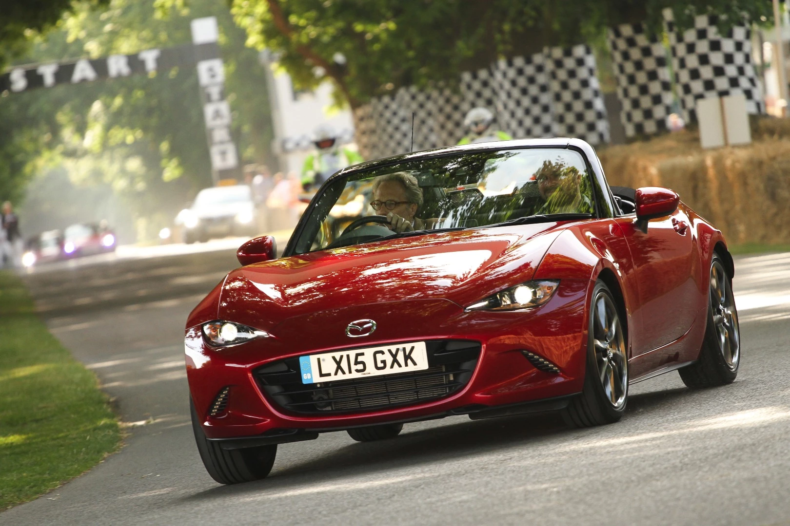 Charles Gordon-Lennox, the Earl of March, is the owner of Goodwood and founder of the Goodwood Festival of Speed. An automotive enthusiast, here he takes Mazda's new MX-5 around the circuit.