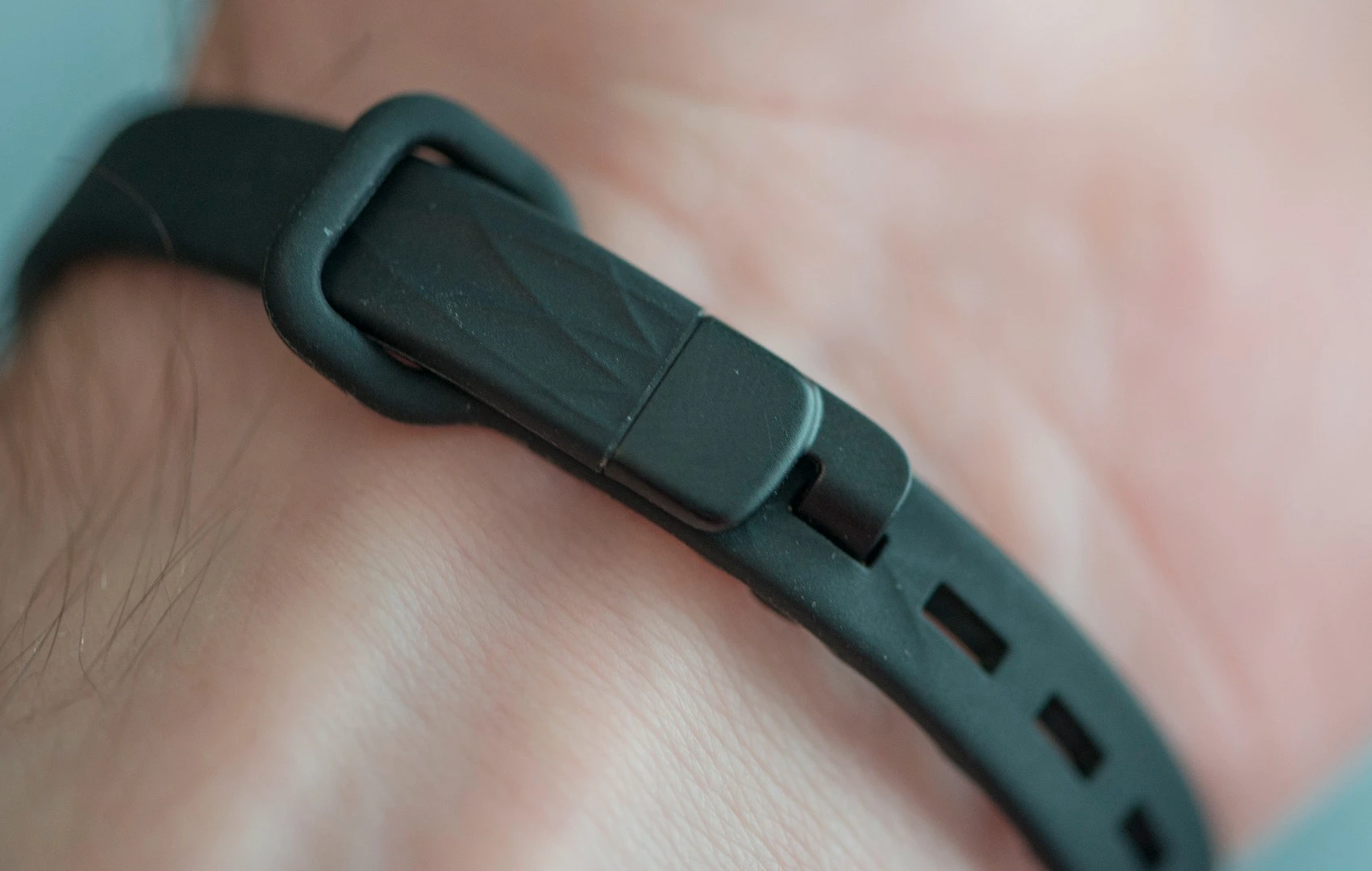 The wrist strap for the Jawbone UP Move fitness tracker uses a hoop and hook fastening