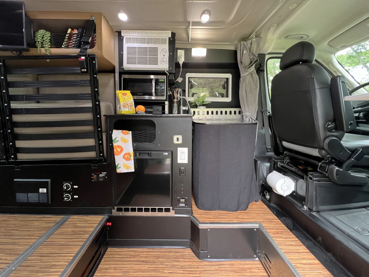 The Maxvan Access kitchen and shower benefit from the sunken floor area that creates a standing height over 6 feet
