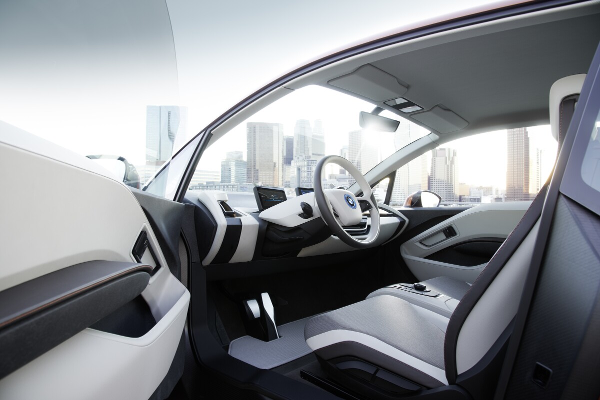 The i3 cockpit uses recycled CFRP in various components to reduce material waste and save money on overall production