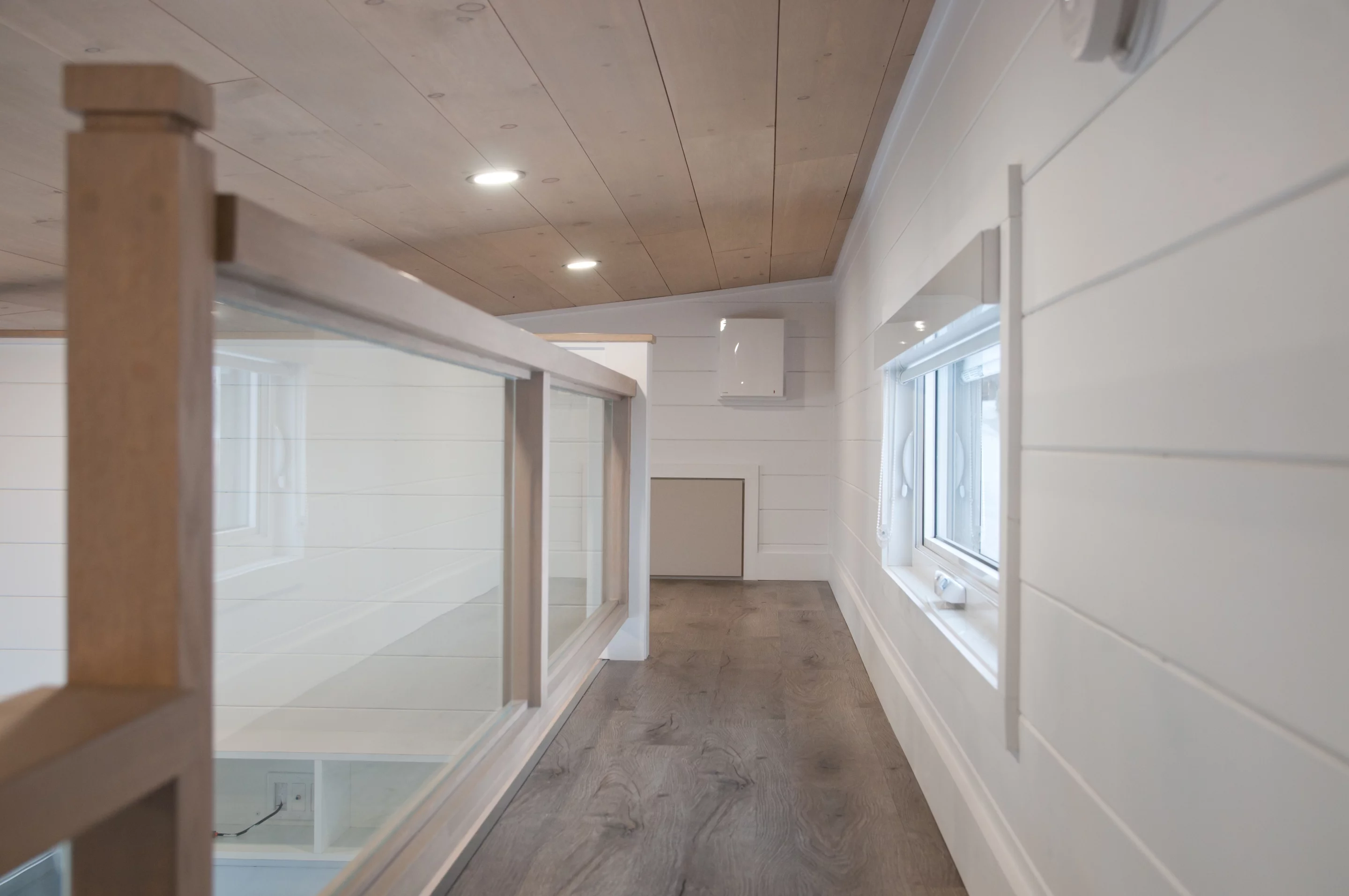 The Charme's two bedroom lofts are connected by a catwalk