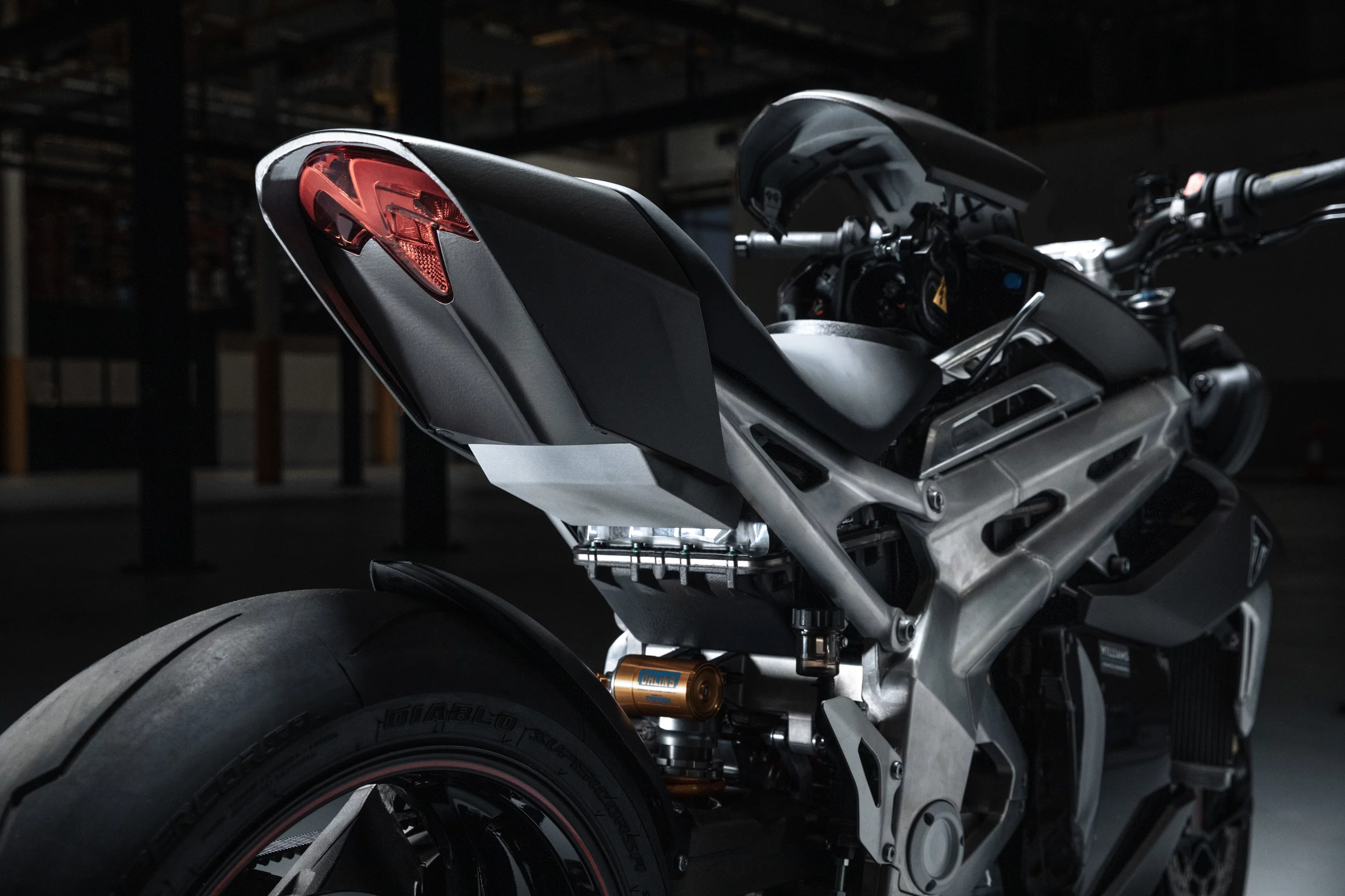 The design is adapted from the Street Triple 1200, but from the looks of things, very few parts carry over between the two