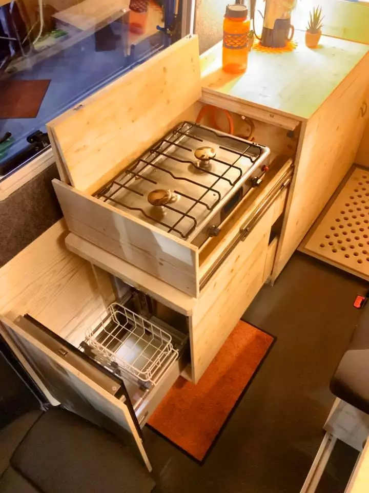 A look the dual-burner stove and fridge