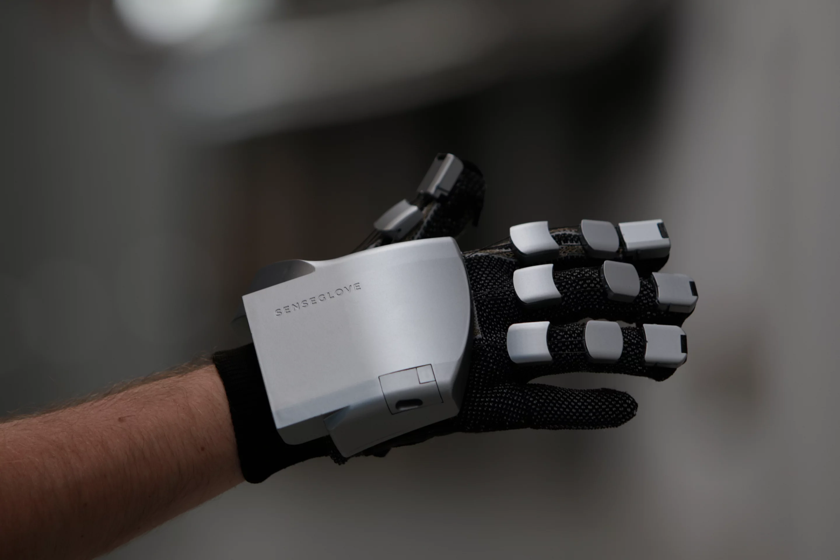 The force-feedback system is made up of magnetic friction brakes that apply resistance to emulate an object's density and size