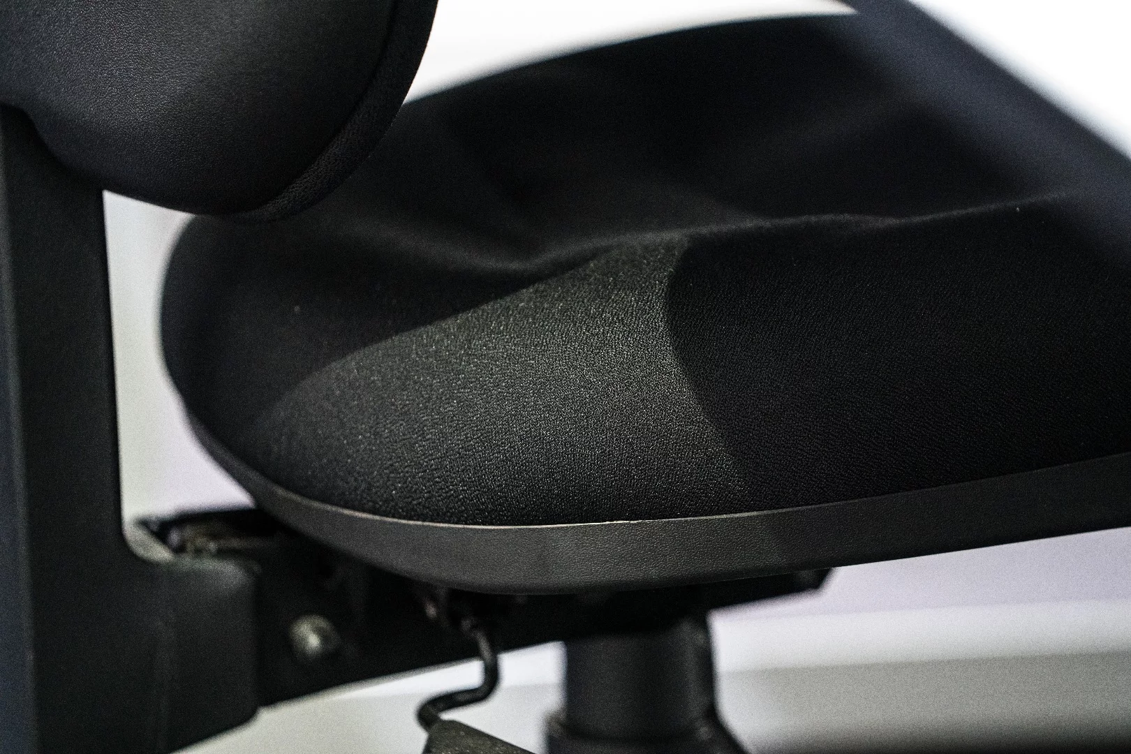 the a9's view of a black chair in shadow under a table – the detail is exquisite