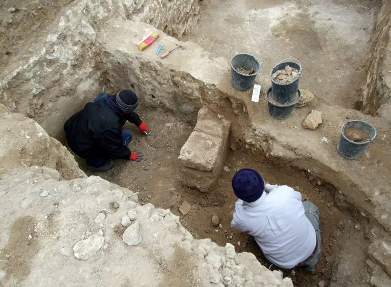 Archaeologists at the site of the largest gate shrine from the First Temple period (8th century BC) in Tel Lachish, Israel