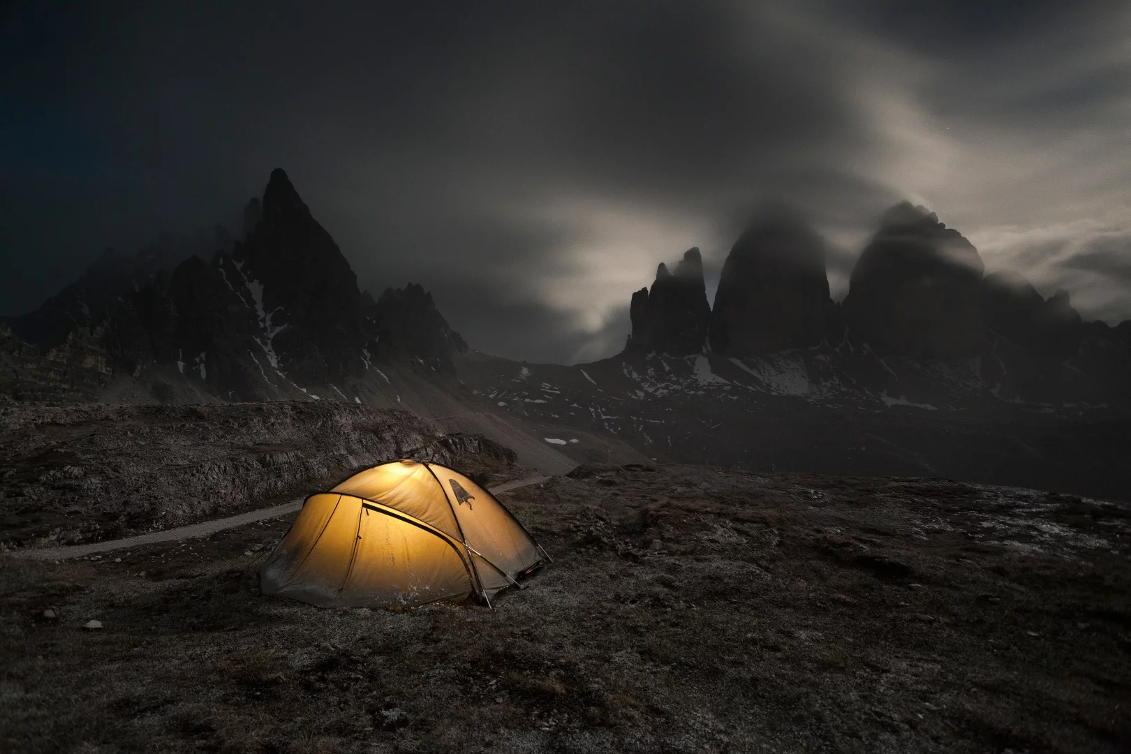 Bivouac at Tre Cime di Lavaredo. Night clear after snowfall. Dolomites, Alps, Italy