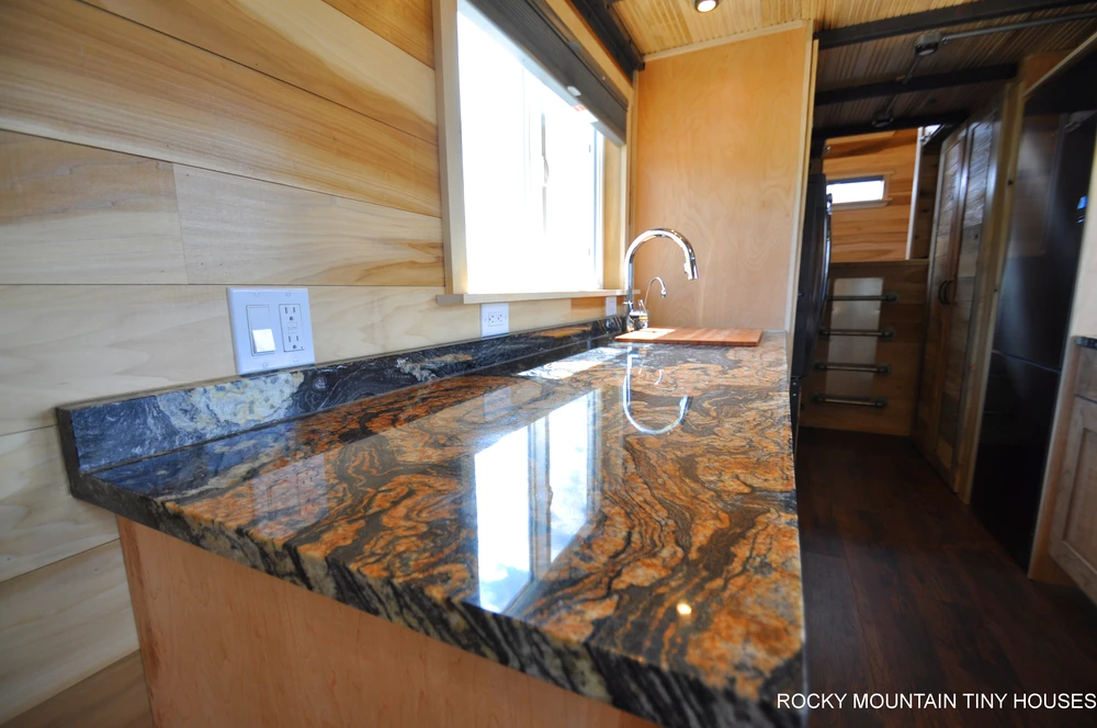 The Pemberley's kitchen includes granite countertops