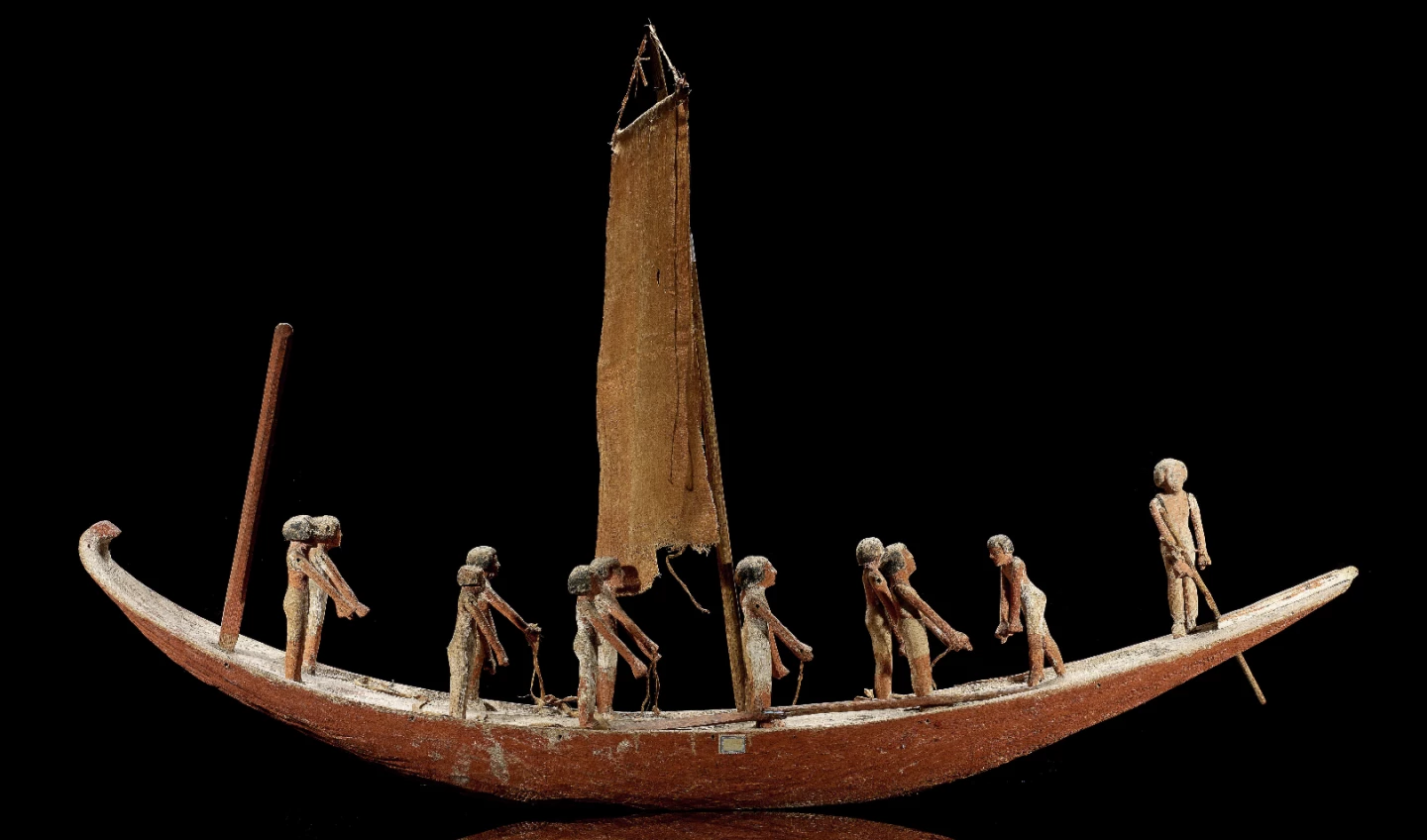 A large wooden model boat from the Egyptian Middle Period 2123-1797 B.C, sold for £161,000 ($201,014) at Bonhams Antiquities Sale in London on 30 November, 2016. Boats were an integral part of Egyptian everyday life and mythology and as such they were considered necessary in the afterlife. Usually two model boats were provided for each tomb, one showing the crew sailing south with the prevailing wind and the other with the crew rowing north. This boat was originally bought by a British army officer in Egypt in the early part of the 20th century and passed by descent to the Scottish private collection from which it was consigned for sale at this auction.