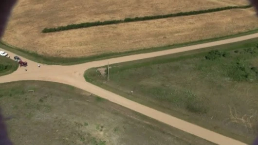 A still from the camera just before it landed, the recovery team can be seen to the left