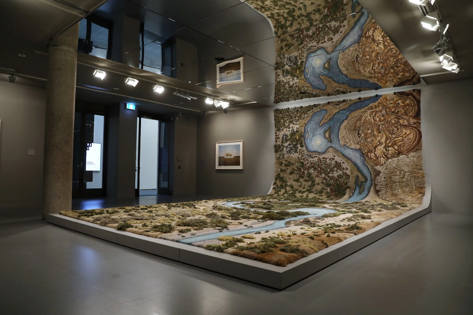 This hand-crafted rug merges traditional making skills with cutting edge drone photography and location mapping to create a detailed aerial landscape out of a textile material
