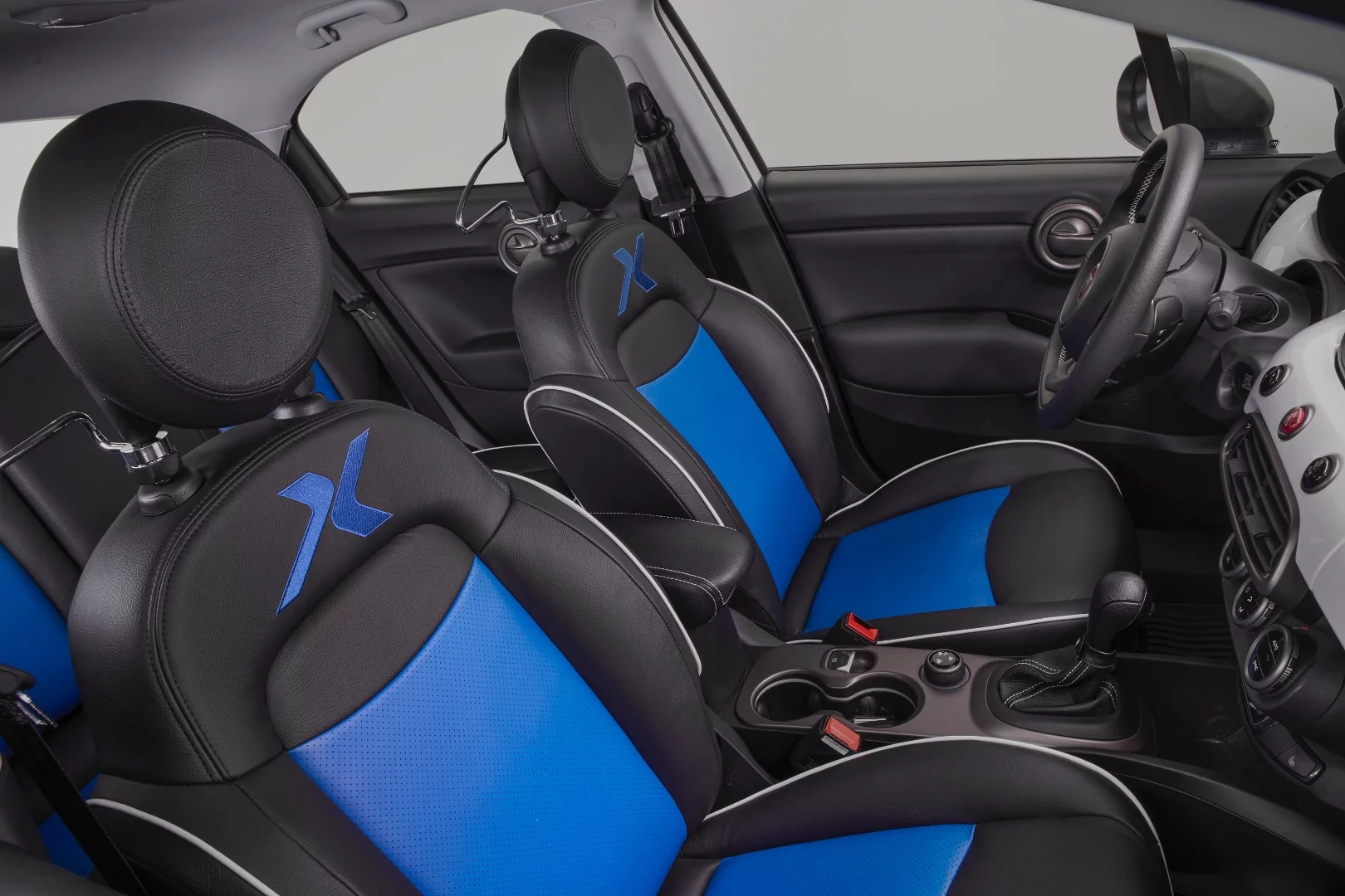 Katzkin leather seating with blue borders to match the exterior and blue accents in the instruments and steering wheel center cap