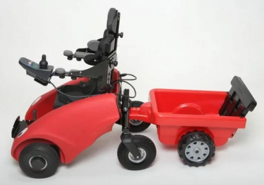 The Wizzybug first mobility vehicle, with trailer attached