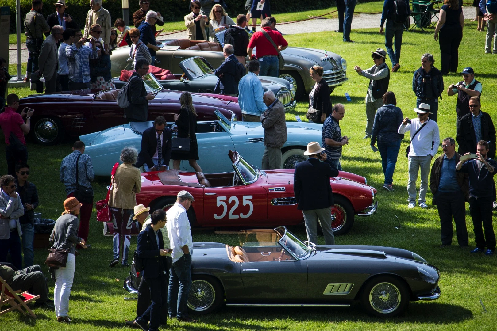 Class F on display: a 1958 250 GT California, a 1957 BMW 507, a 1952 Pegaso Z-102, a 1953 Lancia Aurelia, a 1952 Cisitalia 202 SC GS, and a 1946 Alfa Romeo 6C 2500 S