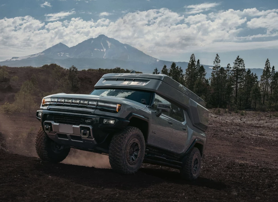 The new EarthCruiser will be muscled to camp aback up to 1,000 hp of Hummer EV Pickup might