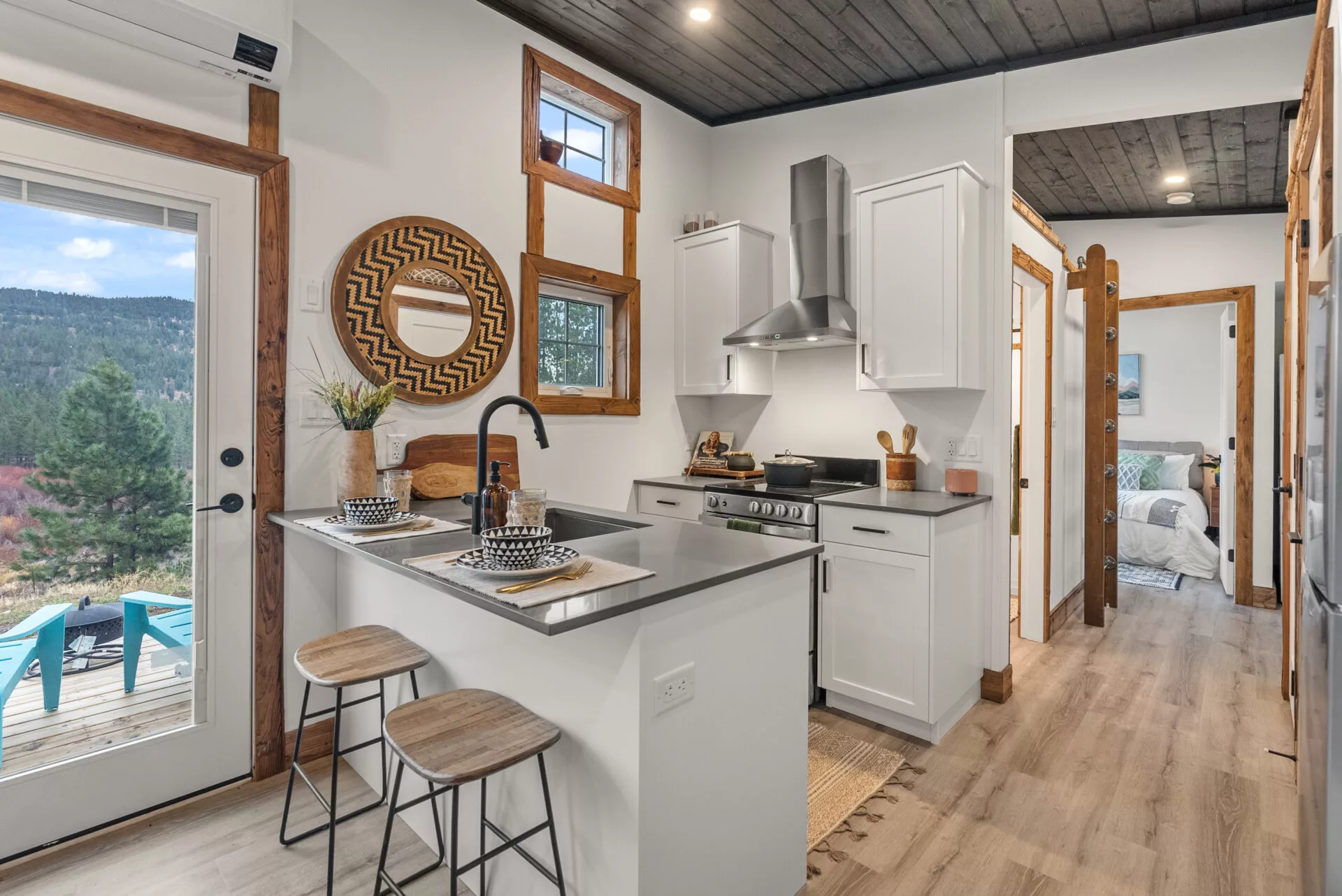 The Silvertip's kitchen includes breakfast bar seating for two