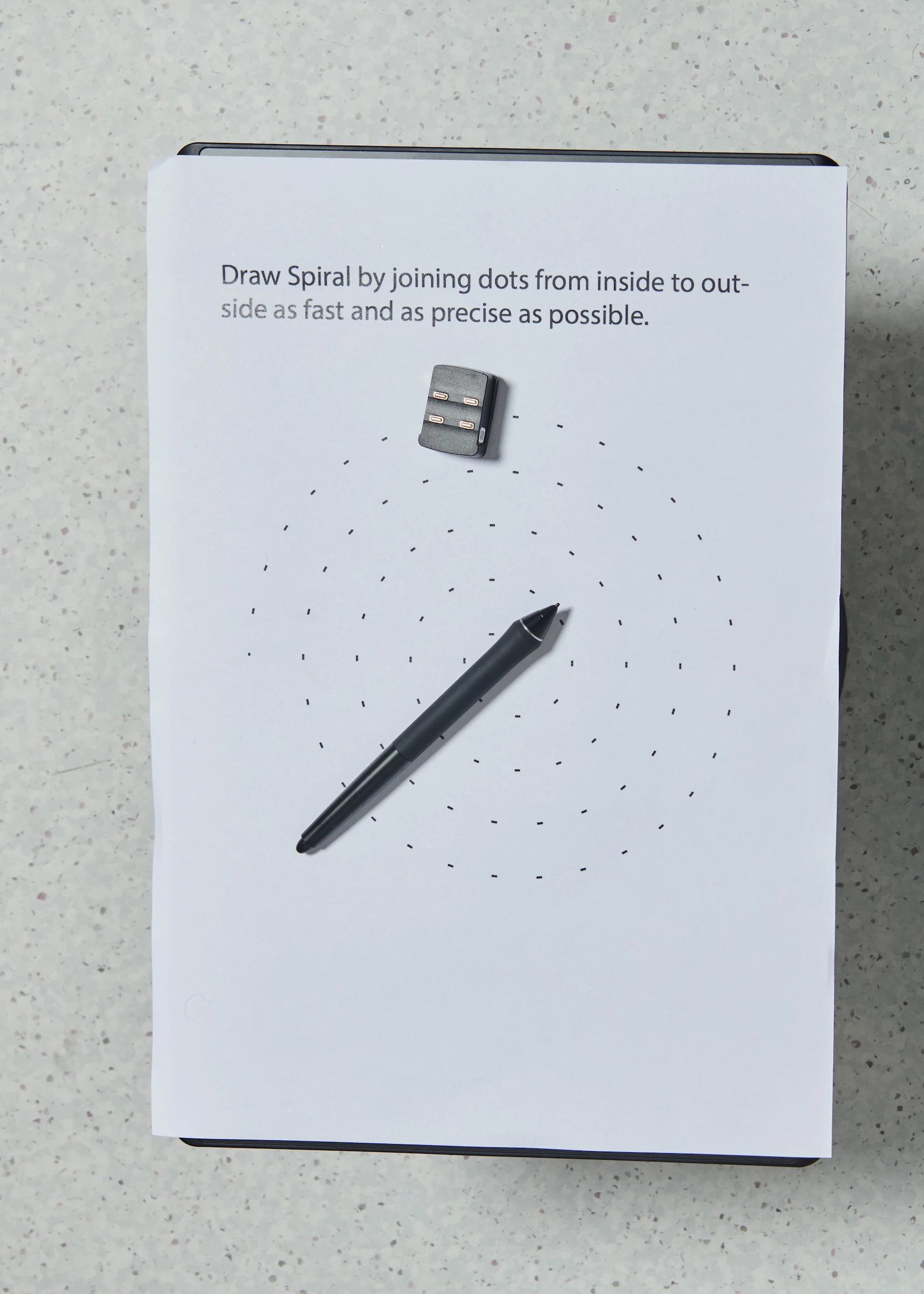 The early detection test for Parkinson's involves a subject undertaking a short series of writing and drawing tasks, with software monitoring the data in real-time